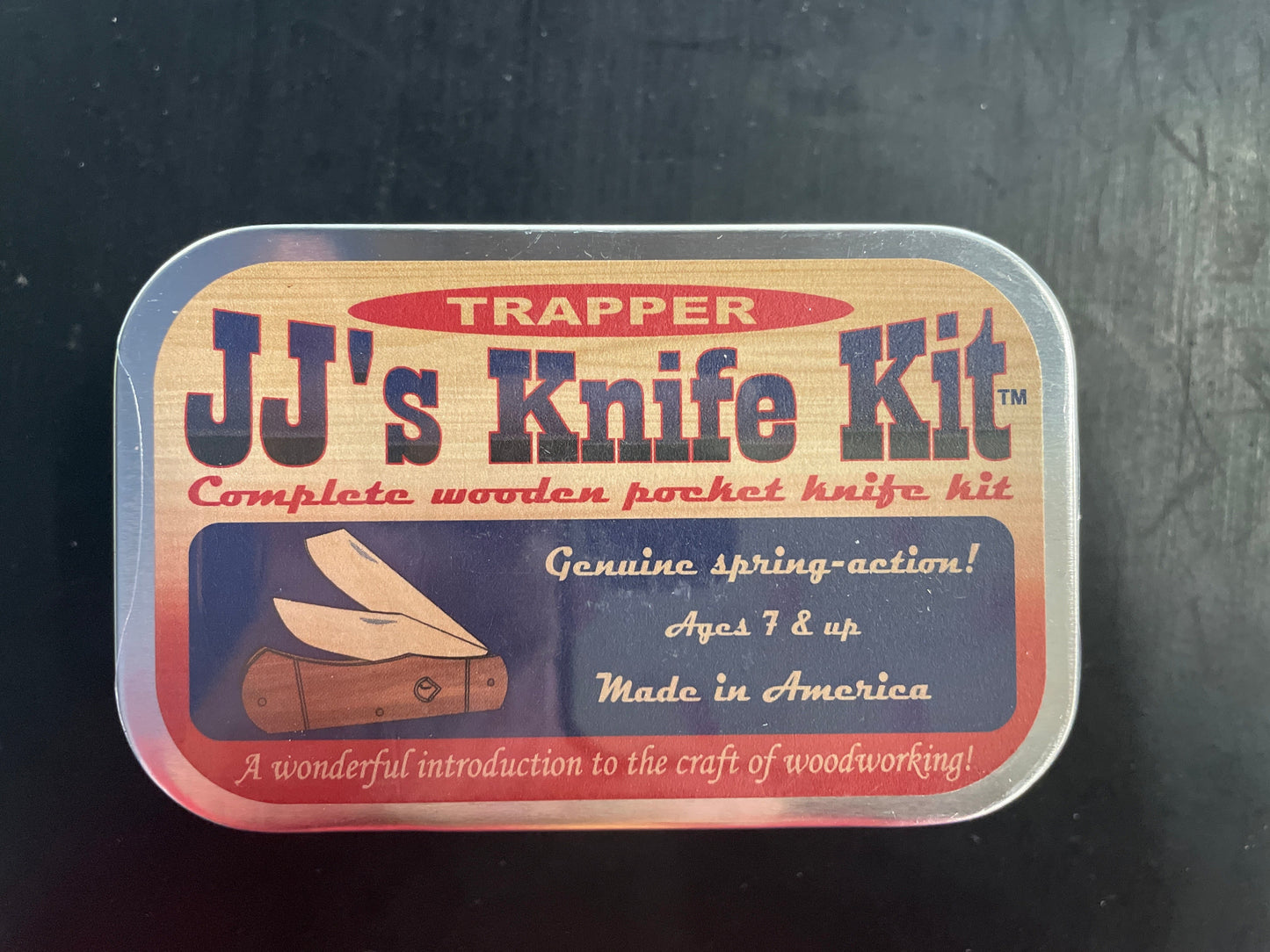 Trapper JJ's Knife Kit packaging on a dark background