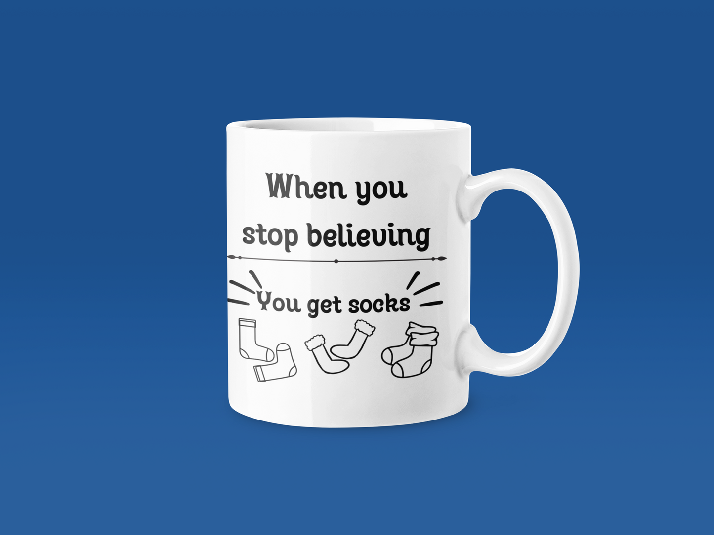 “When You Stop Believing, You Get Socks” – 11 oz Holiday Humor Mug