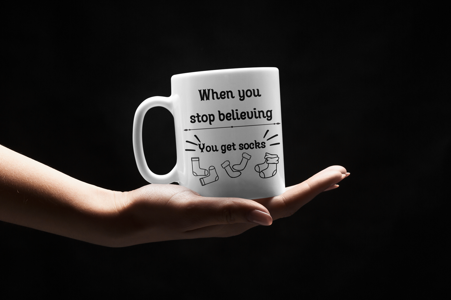 “When You Stop Believing, You Get Socks” – 11 oz Holiday Humor Mug